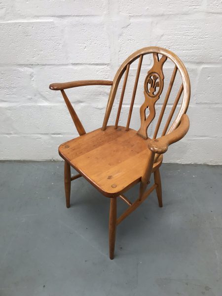 This chair is unrestored but in good vintage condition with tight joints and no wobble on a flat surface. The frame and seat show wear commensurate with its age, and the elm seats in particular have a lovely grain and patina. Please review photos - happy to answer any questions.